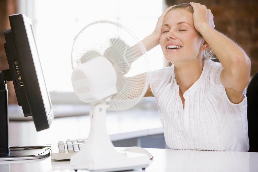 girl with desk fan