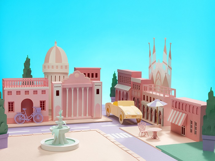 carton pink illustration of a fictional city 