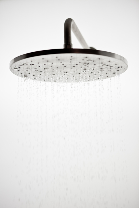 Rain-style shower head over white background