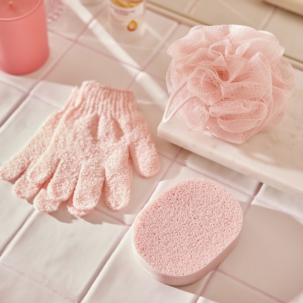 lifestyle image of pink bath accessories 